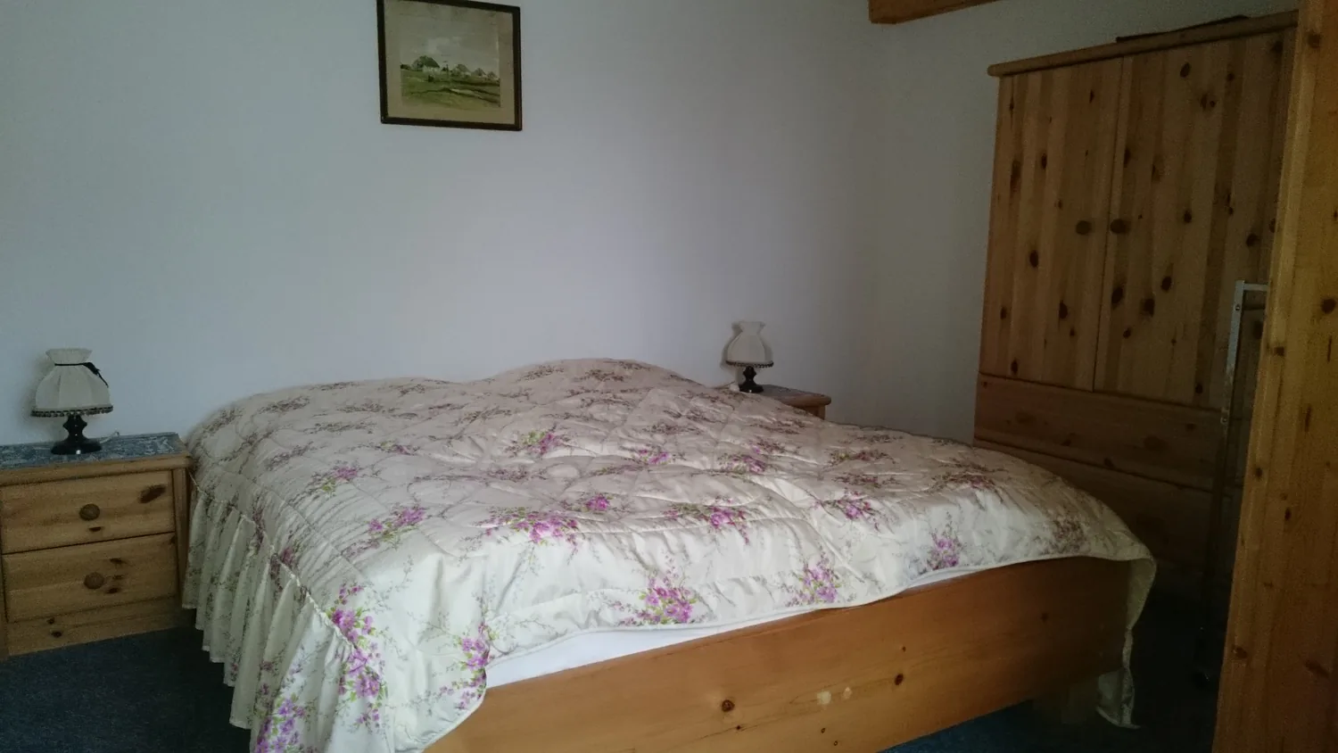 Schlafzimmer einer Ferienunterkunft in Neuendorf